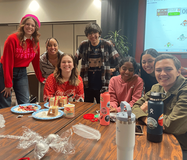 a group of people around a table
