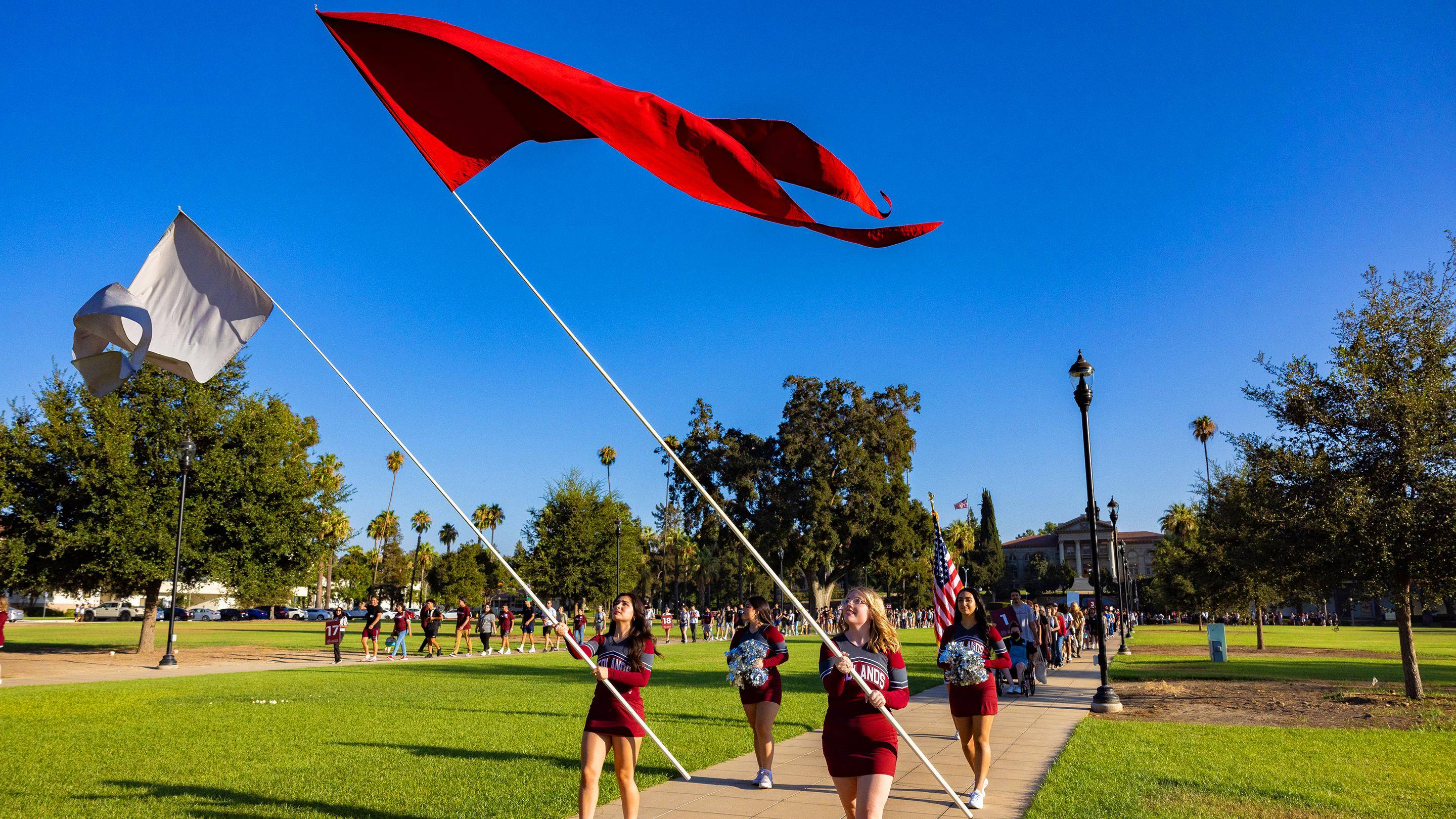 a group of people holding a flag