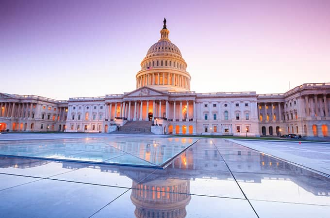 a large white building with a dome and columns