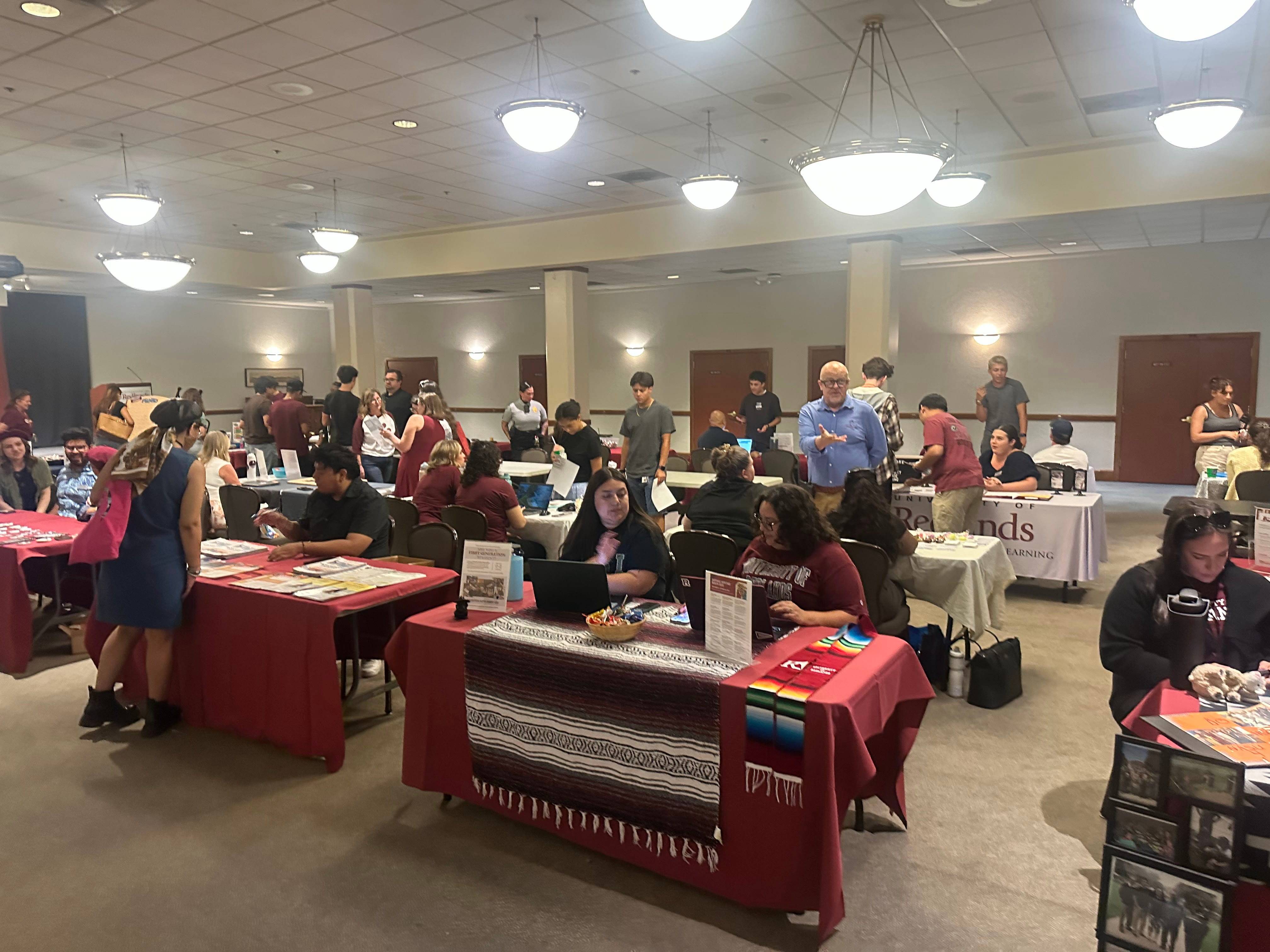 a group of people sitting at tables in a room