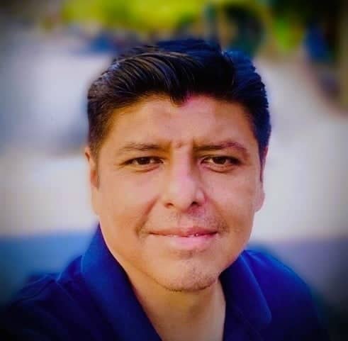 a person smiling for the camera