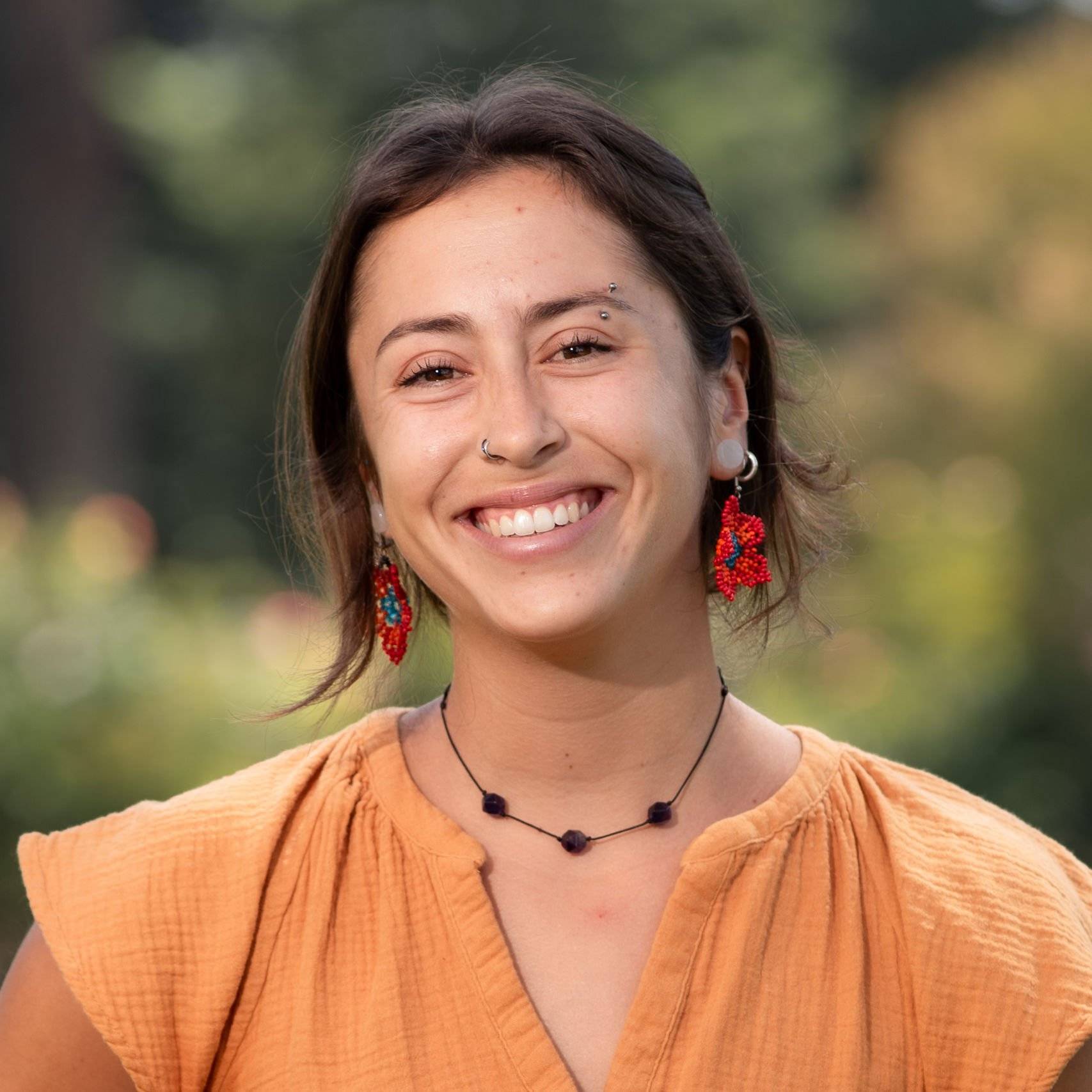 a person smiling at camera