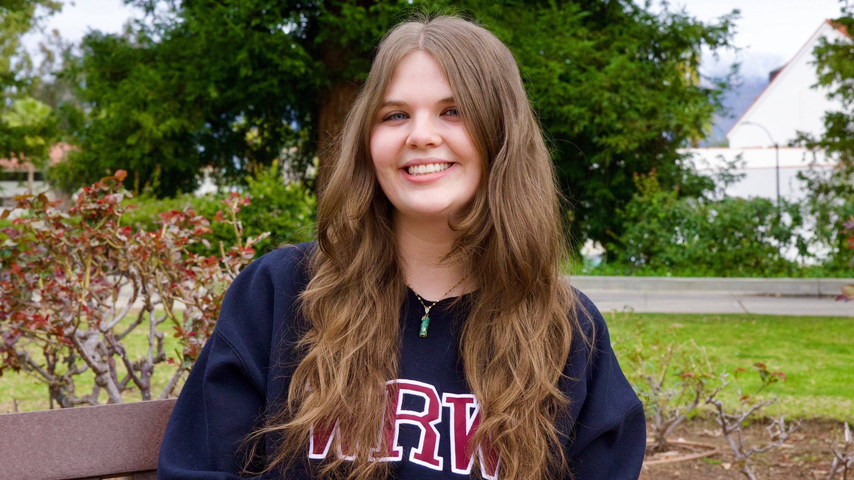 a person smiling at camera