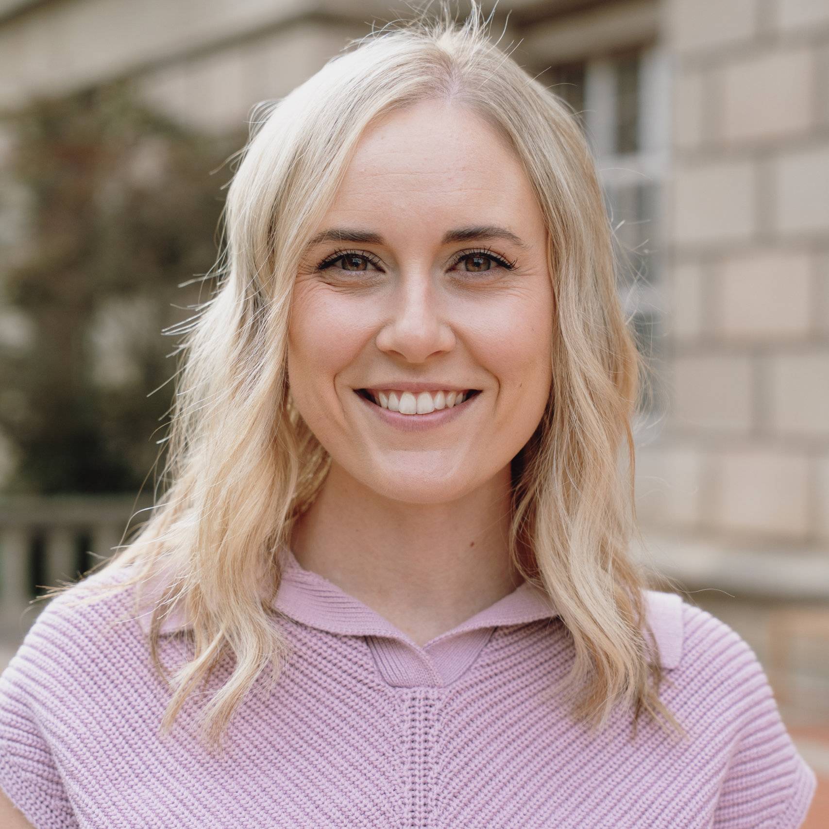 a person smiling at camera