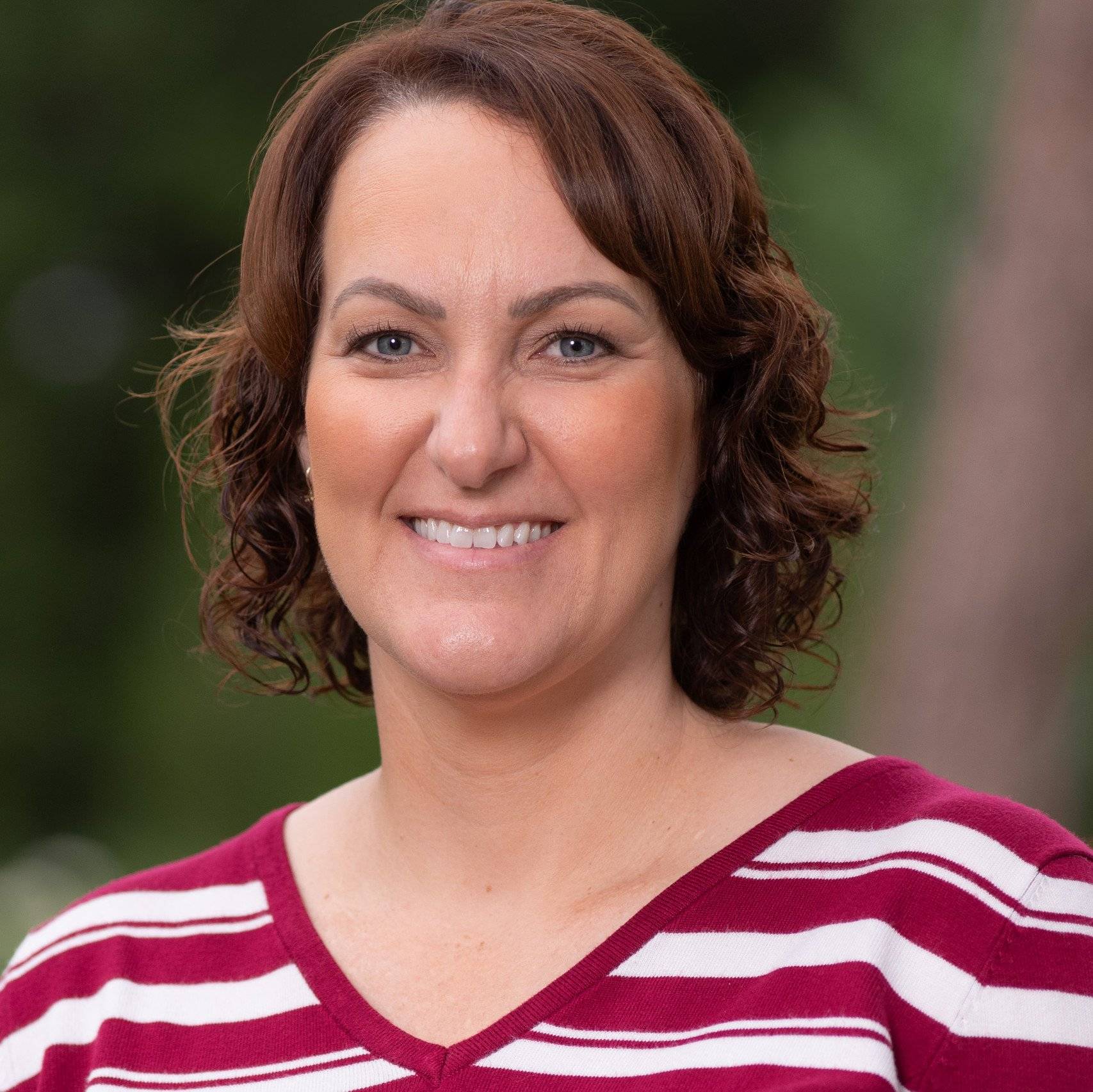 a person smiling at camera