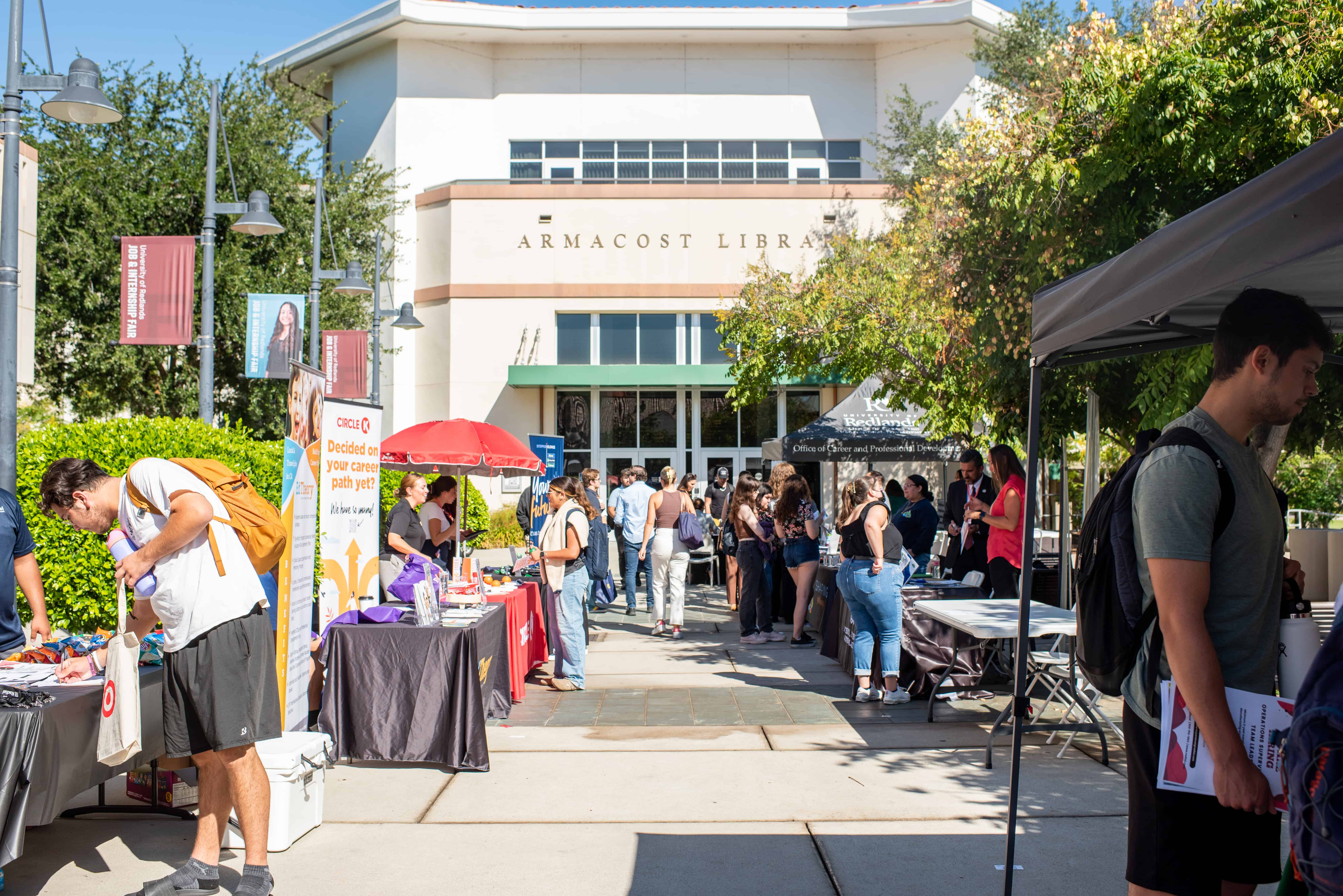 a group of people outside a library