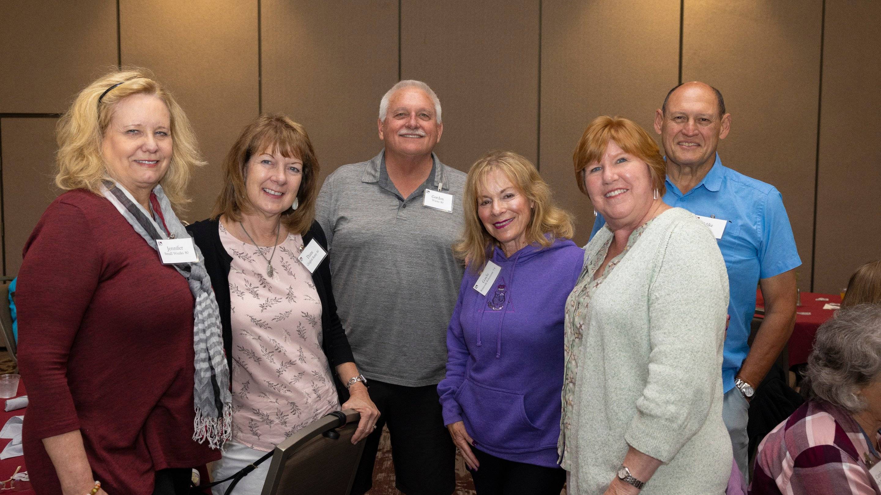 a group of people posing for a photo