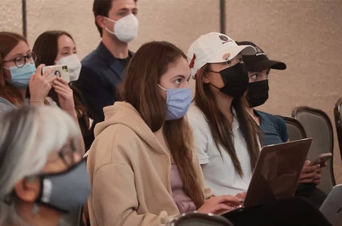 a group of people wearing face masks
