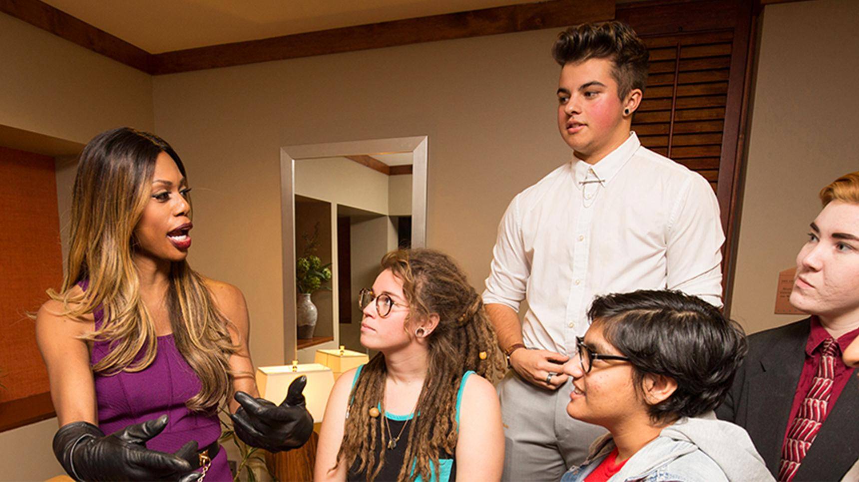 a group of people standing in a room