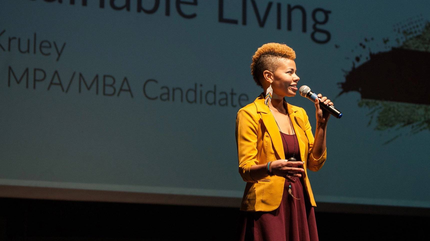 a person speaking into a microphone