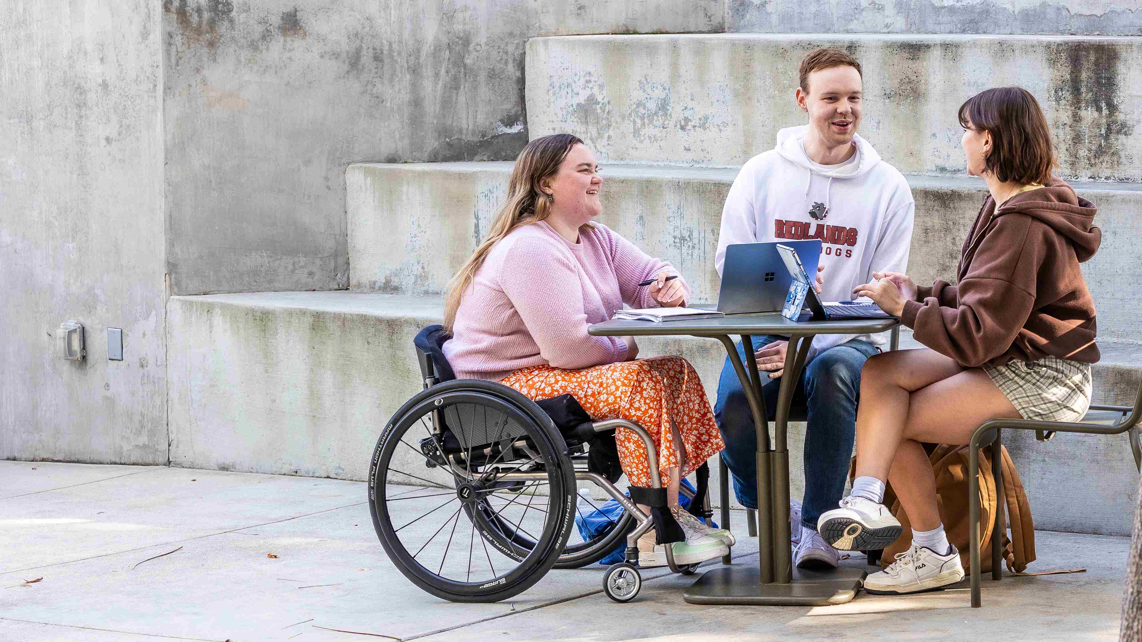 a group of people sitting at a table
