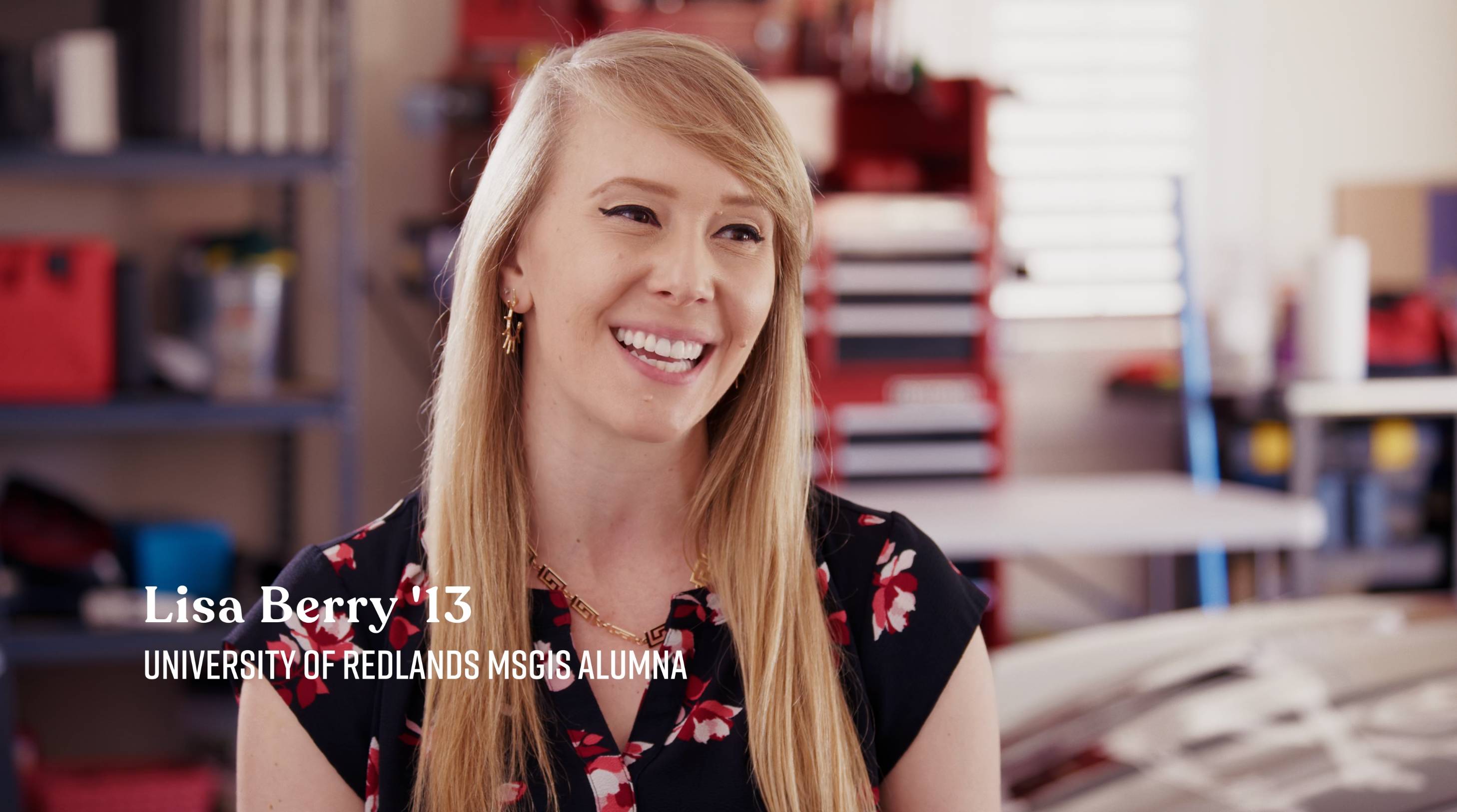 a person smiling with blonde hair