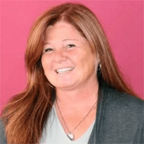 a person smiling at the camera