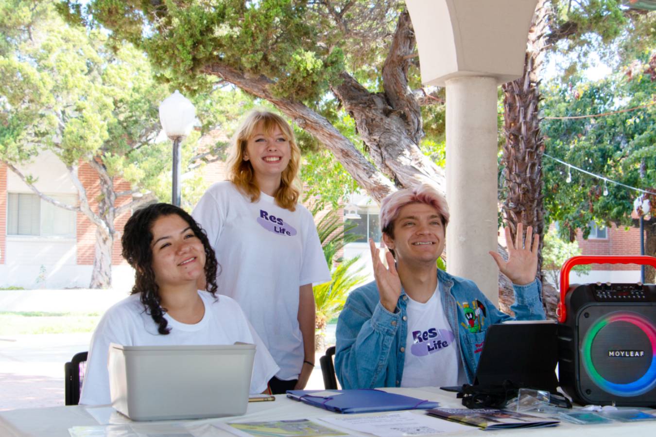 a group of people sitting at a table
