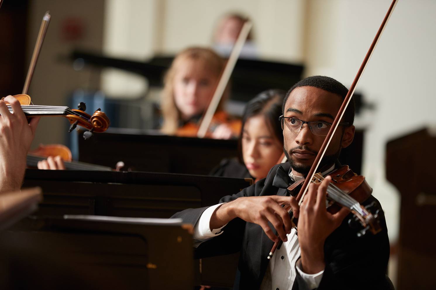 a person playing a violin
