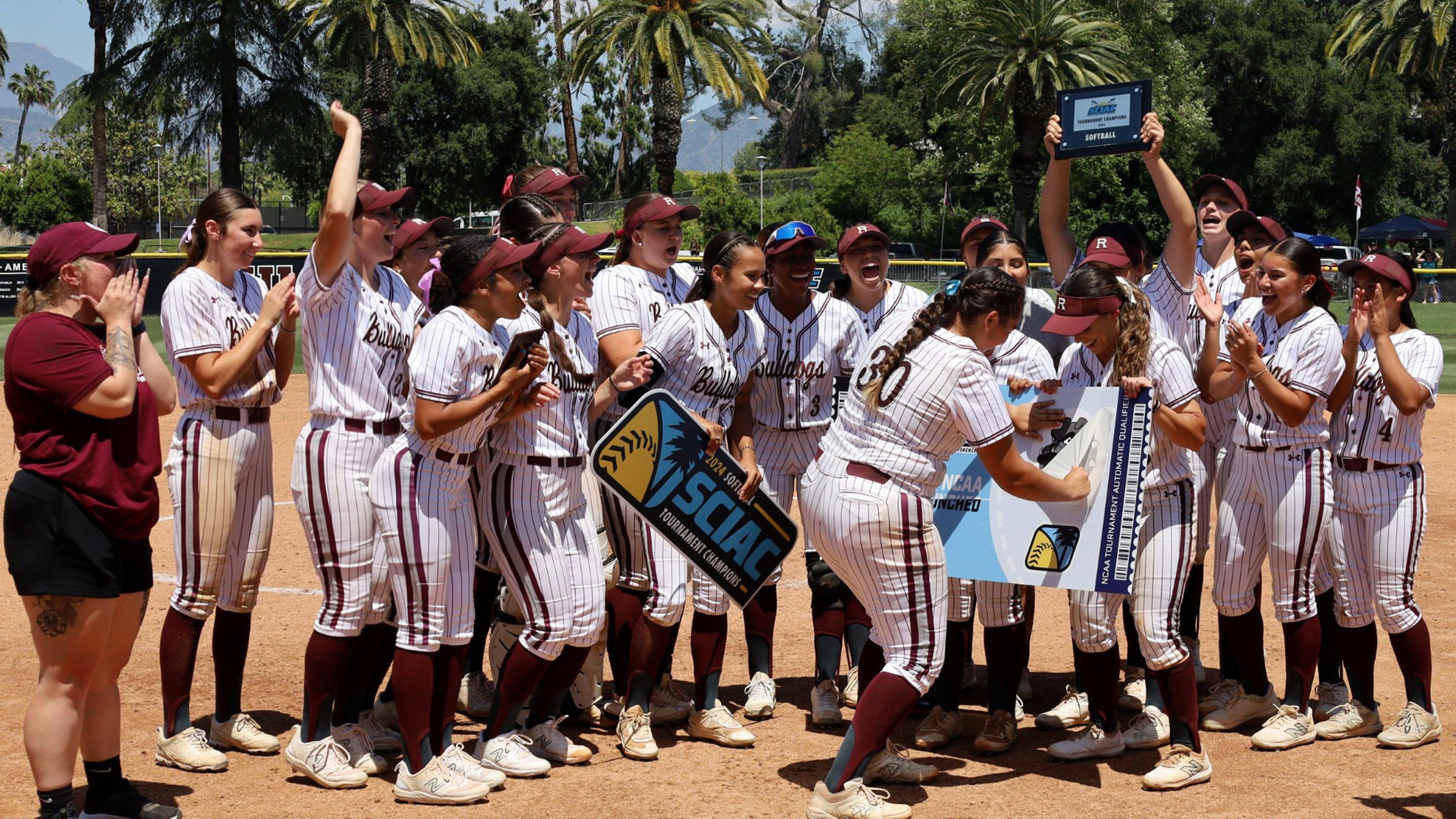 a group of women in baseball uniforms