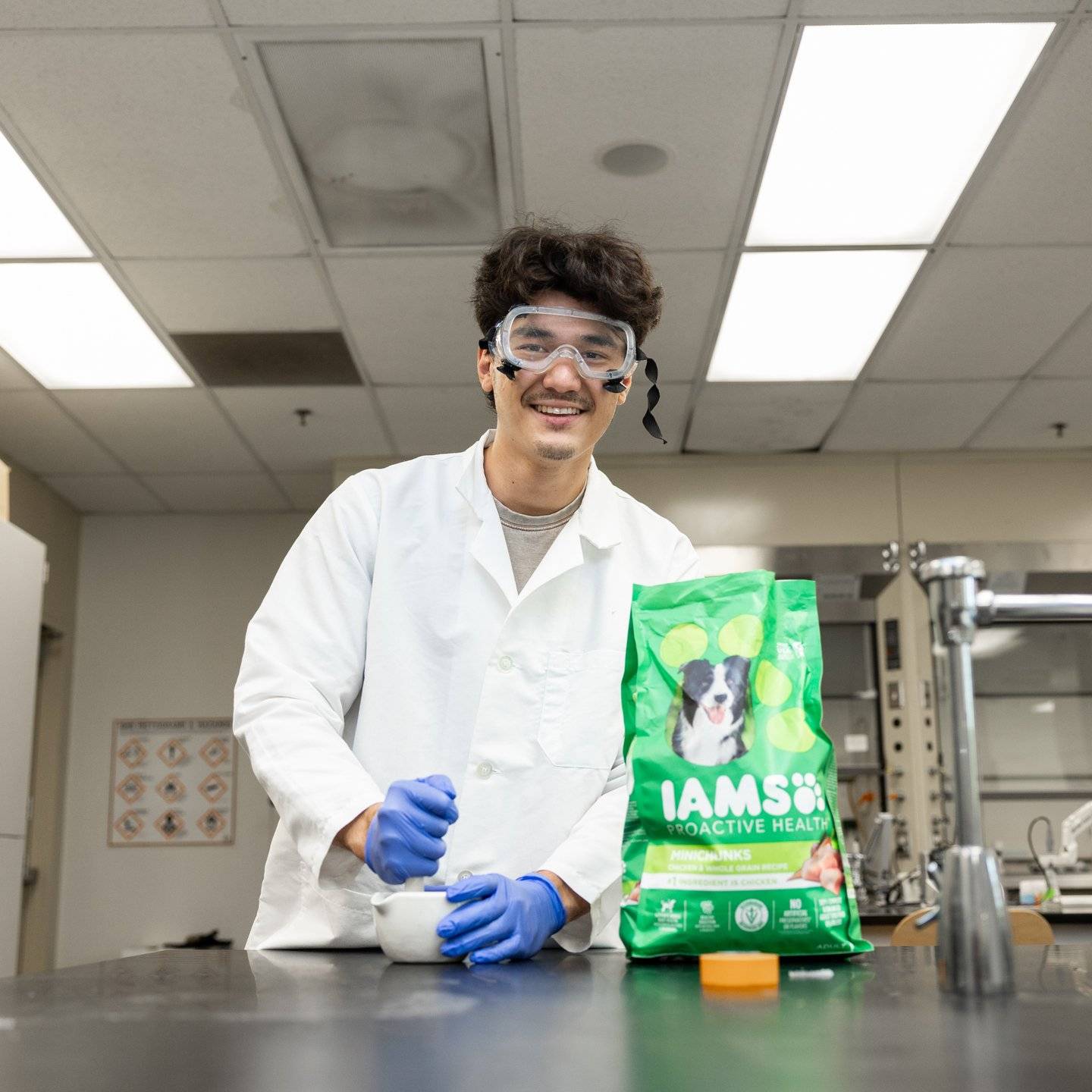 a person wearing goggles and gloves