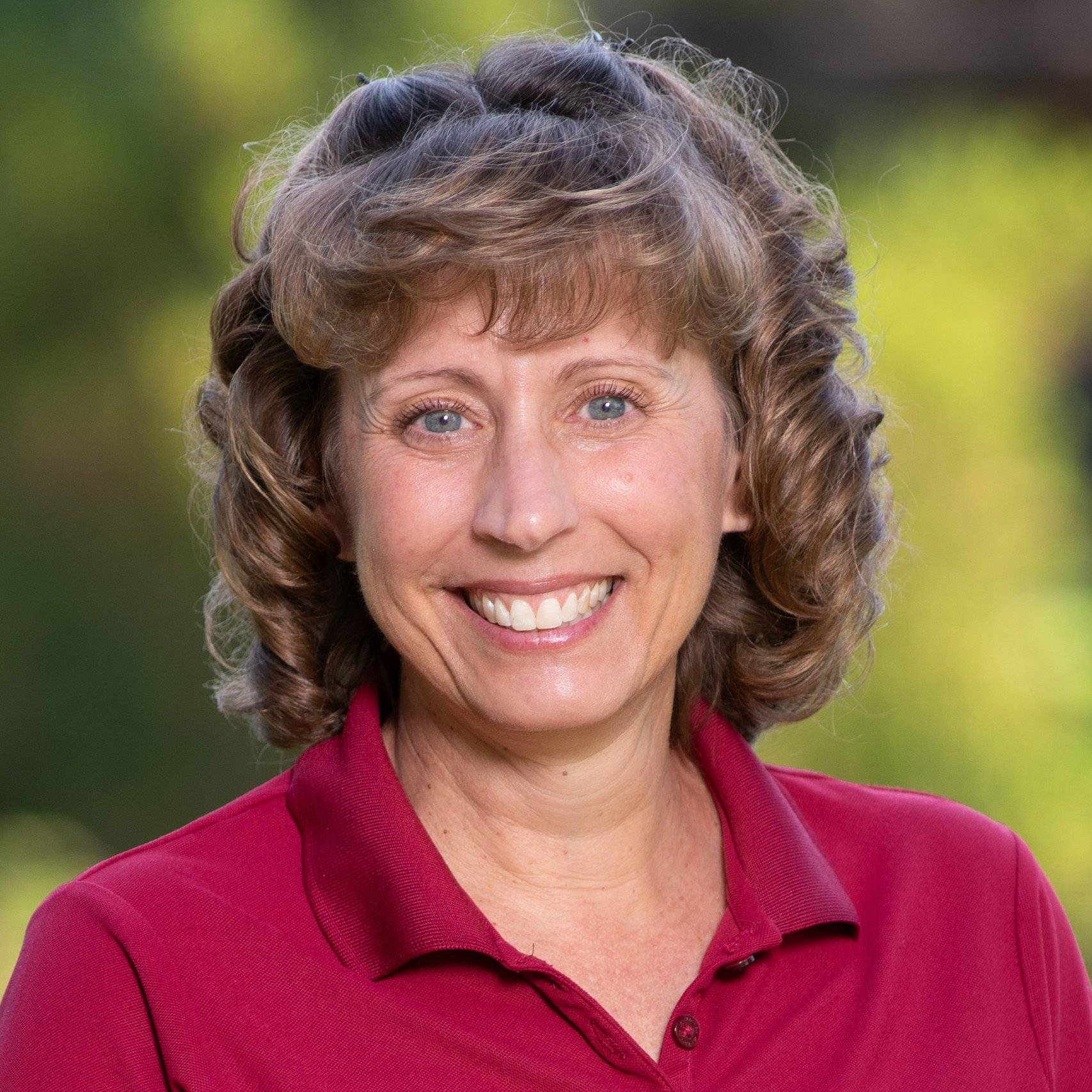 a person smiling at camera