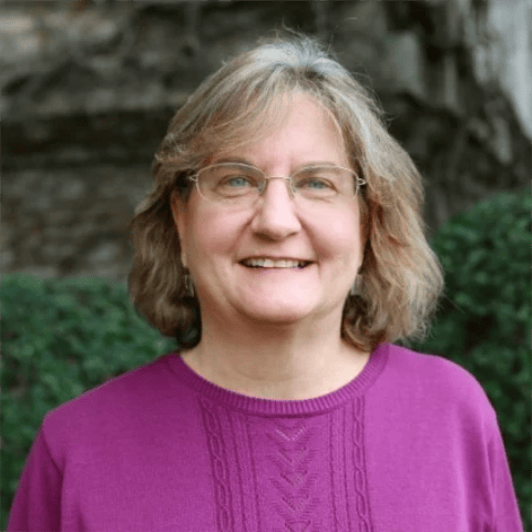 a person in a purple shirt