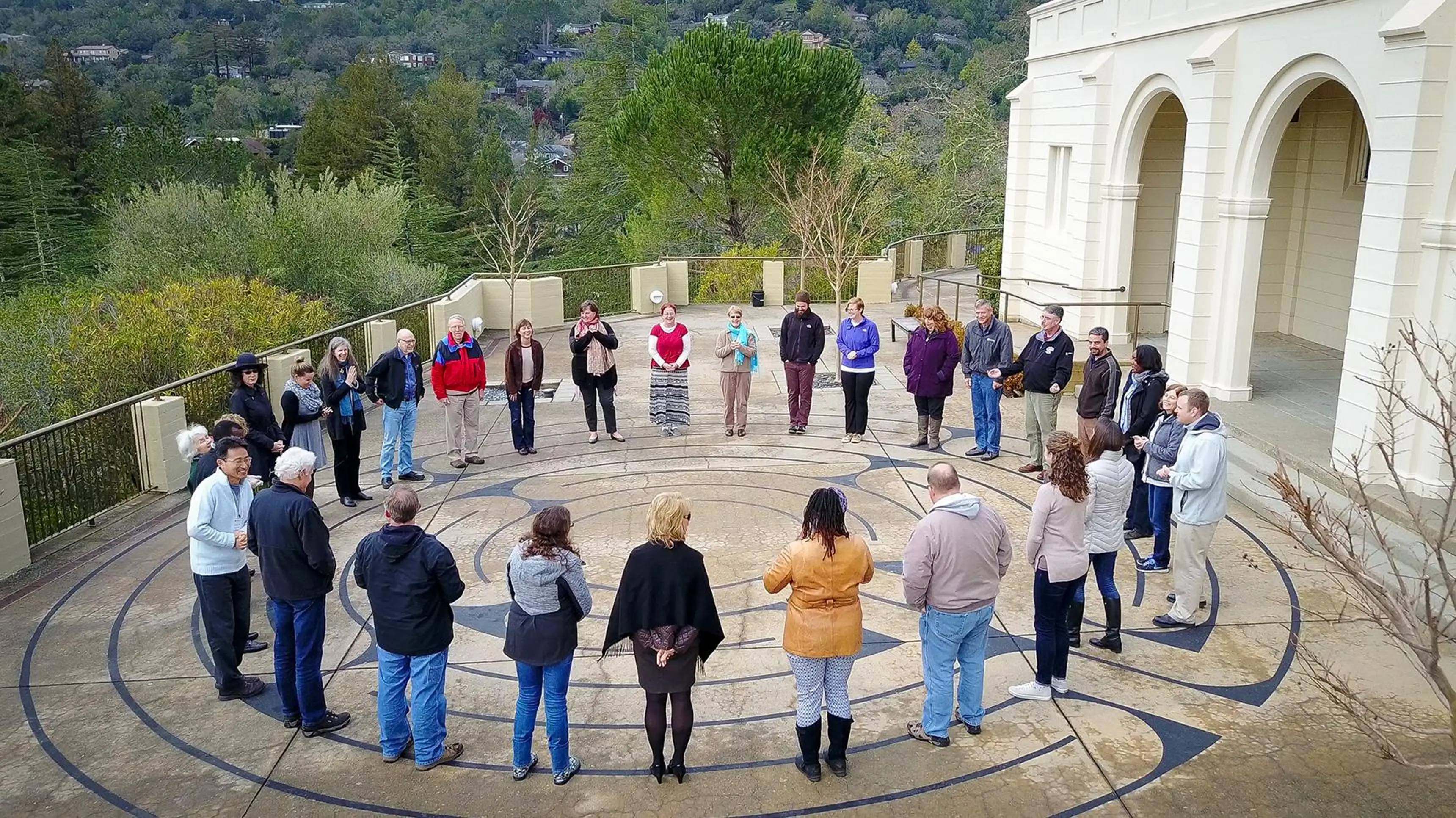 a group of people standing in a circle