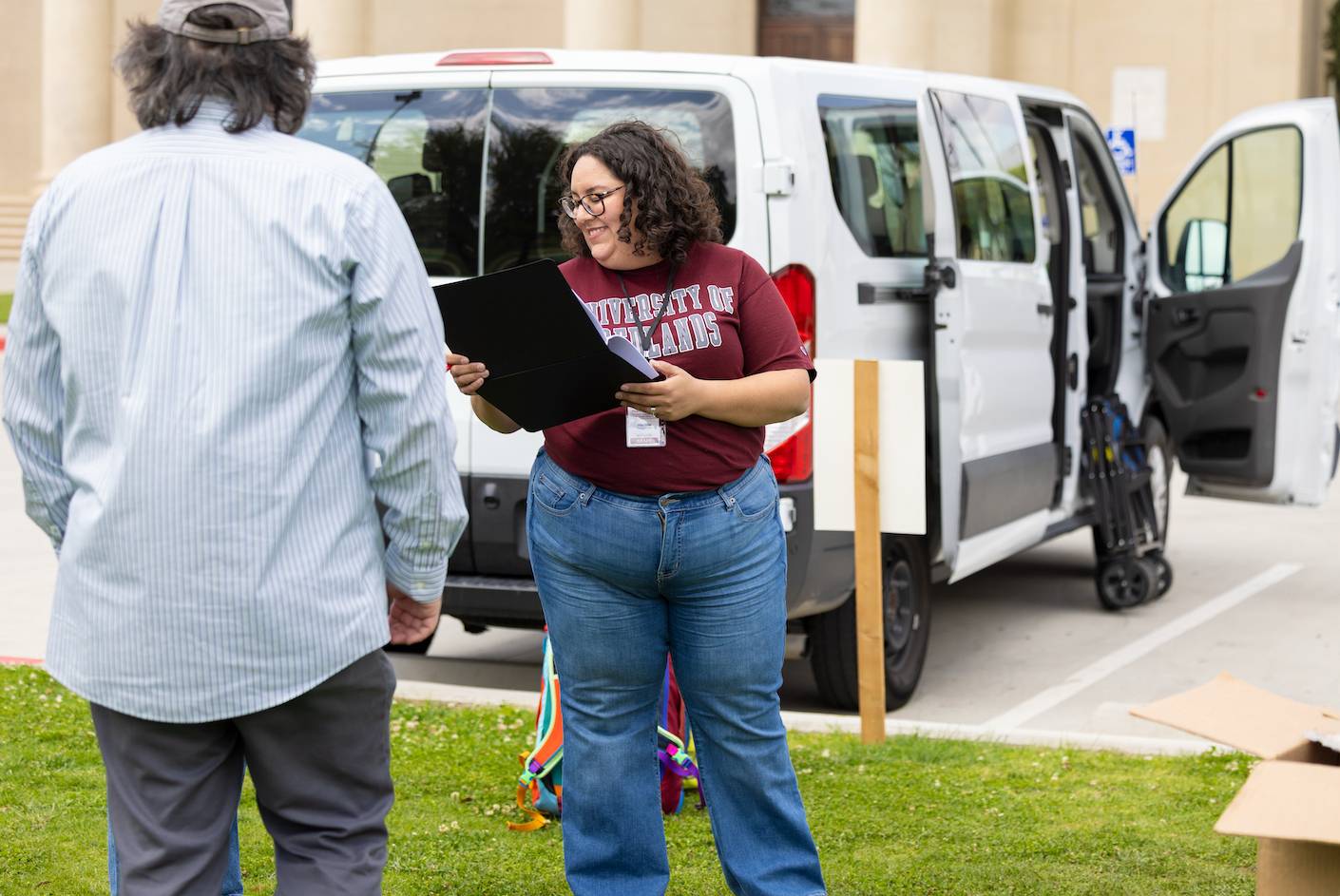 a person standing in front of a van