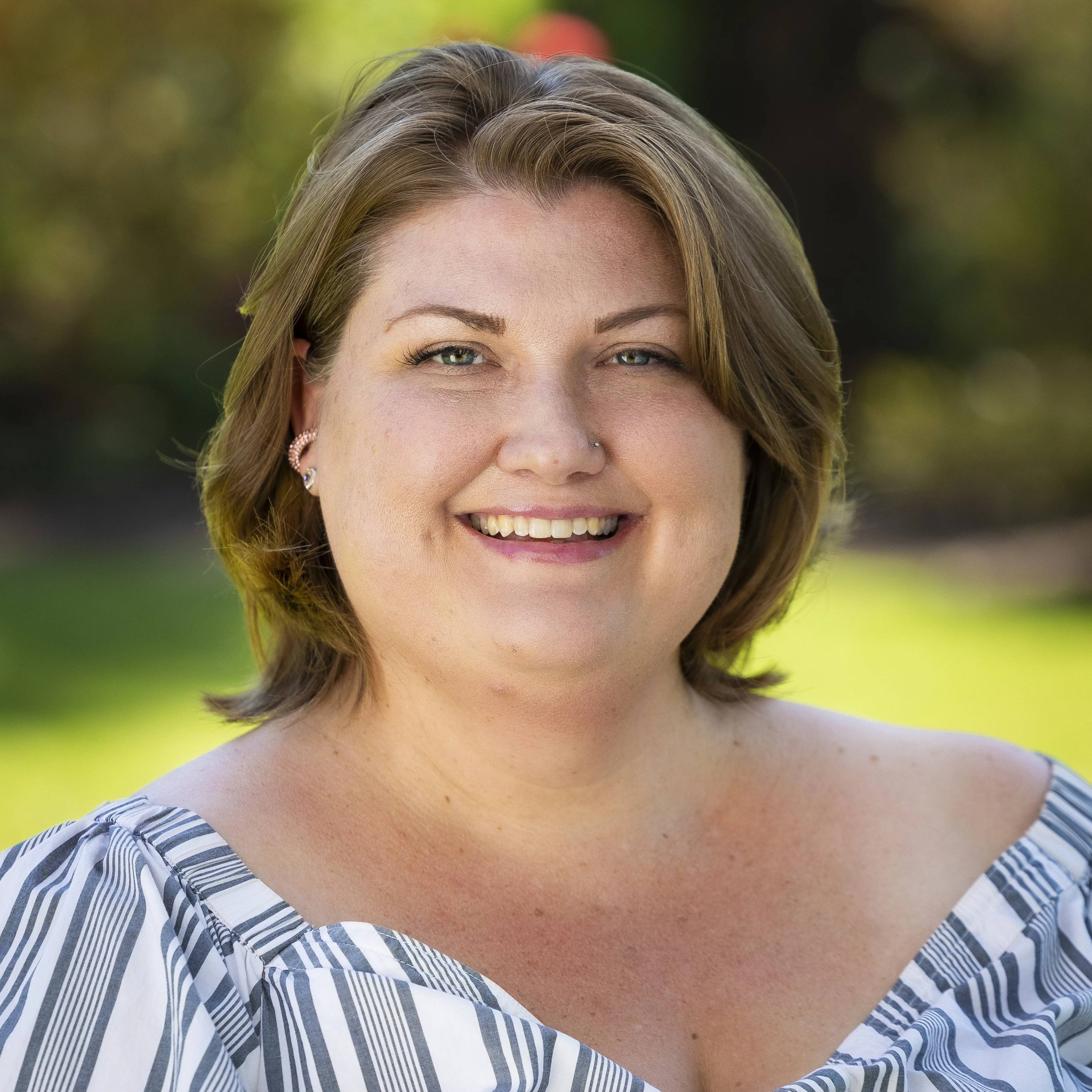 a person smiling at camera