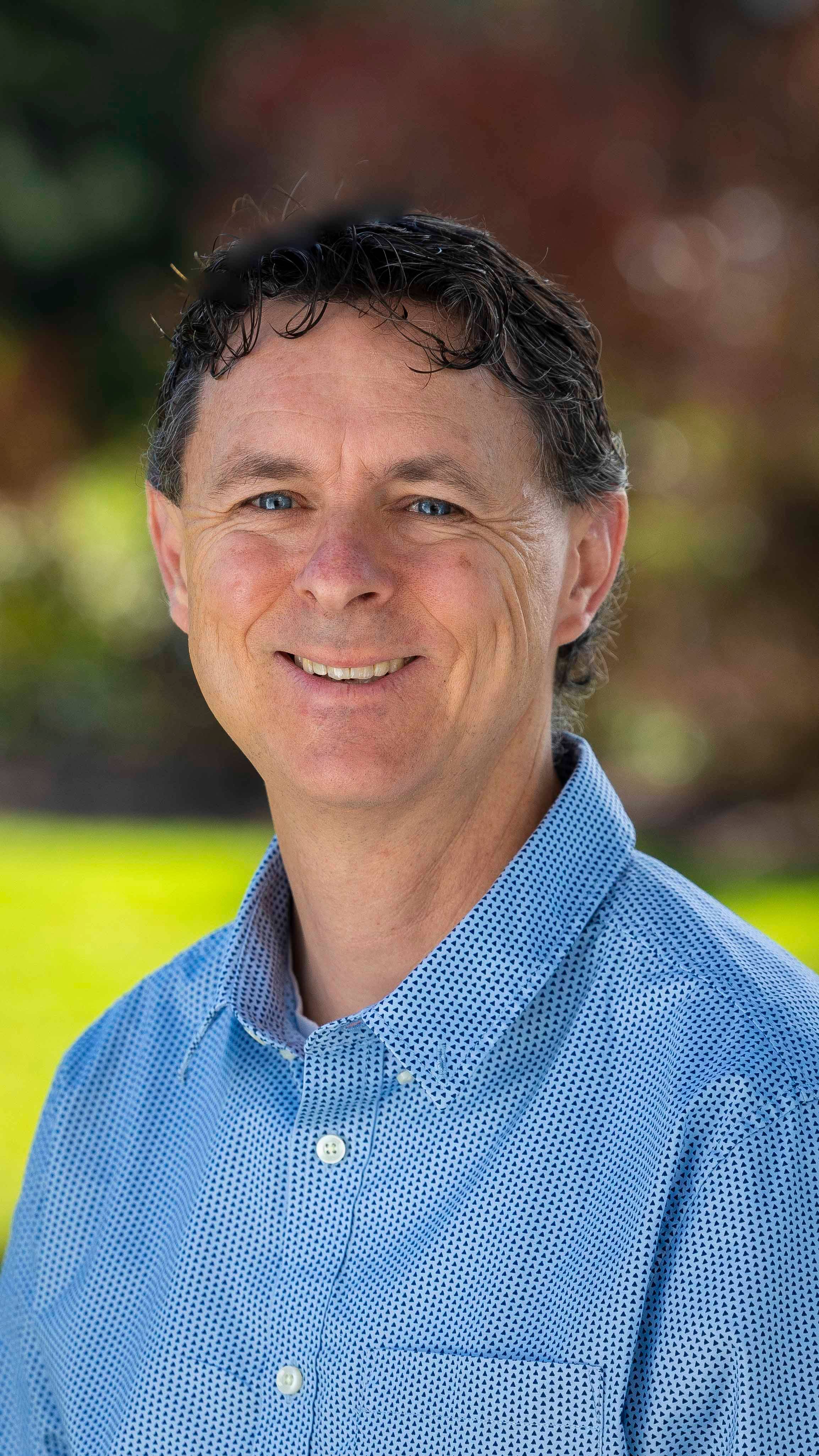 a person smiling for a picture