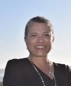 a person smiling at the camera