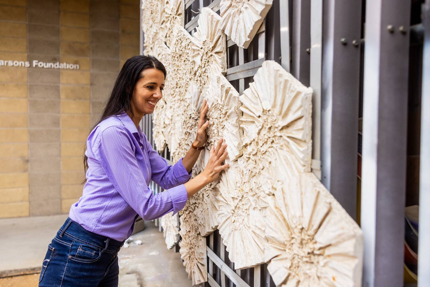 a person touching a wall