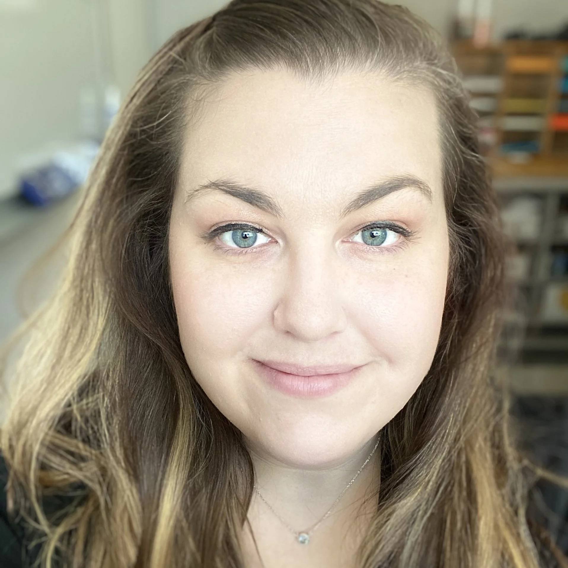 a person smiling for a selfie