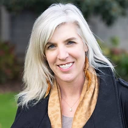 a person smiling at the camera