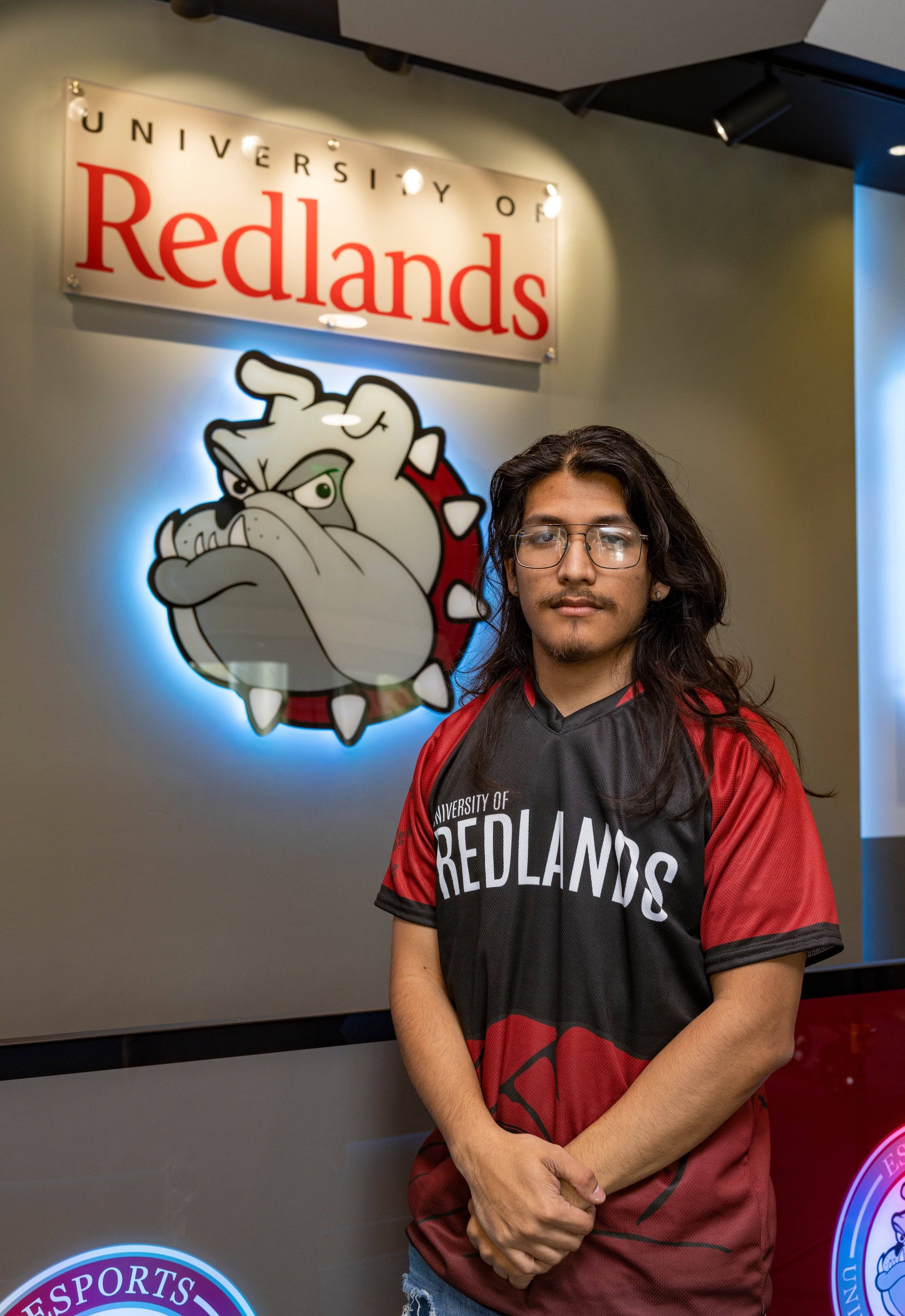 a person standing in front of a sign