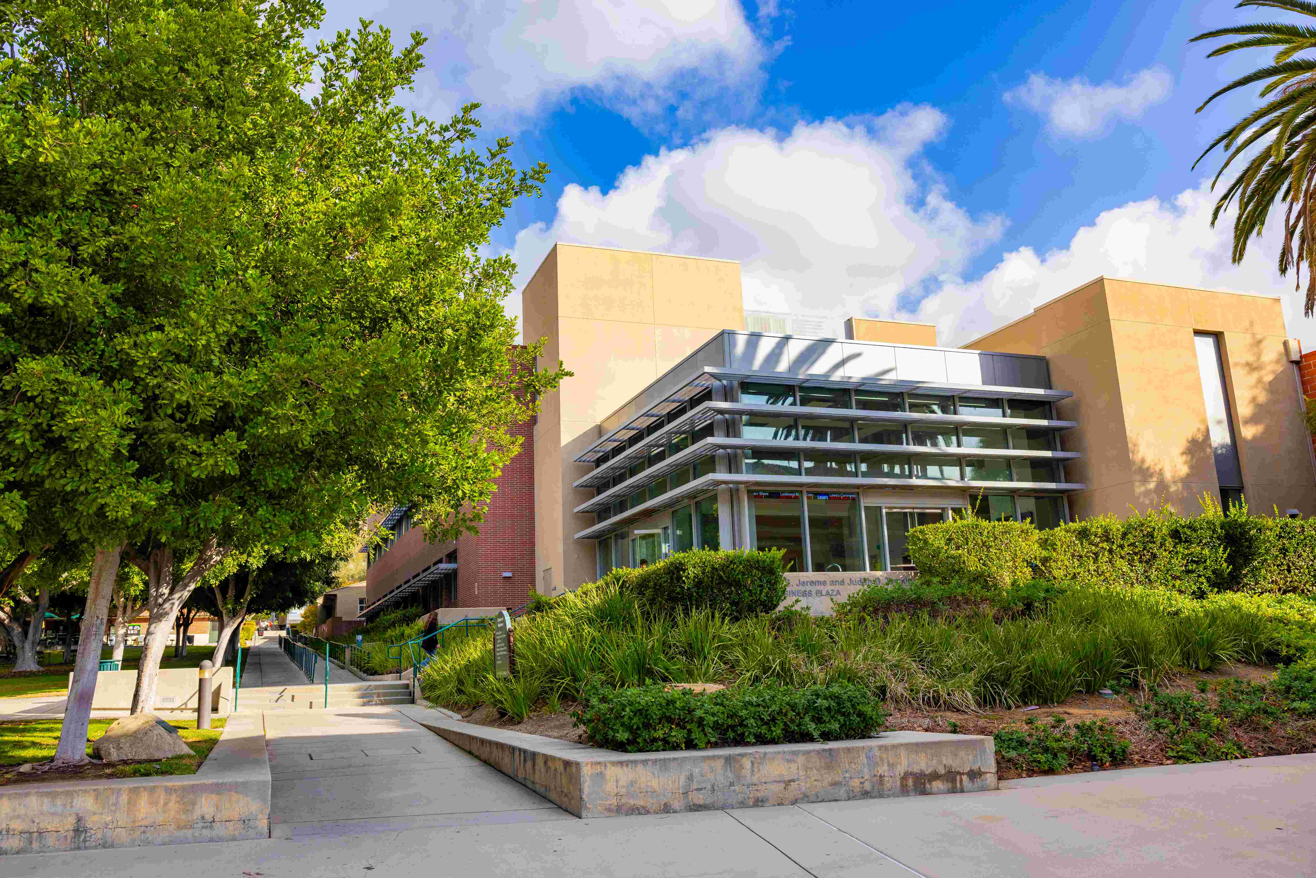 a building with trees and bushes
