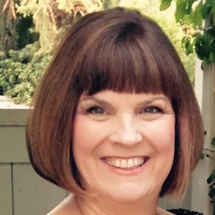 a person smiling at the camera