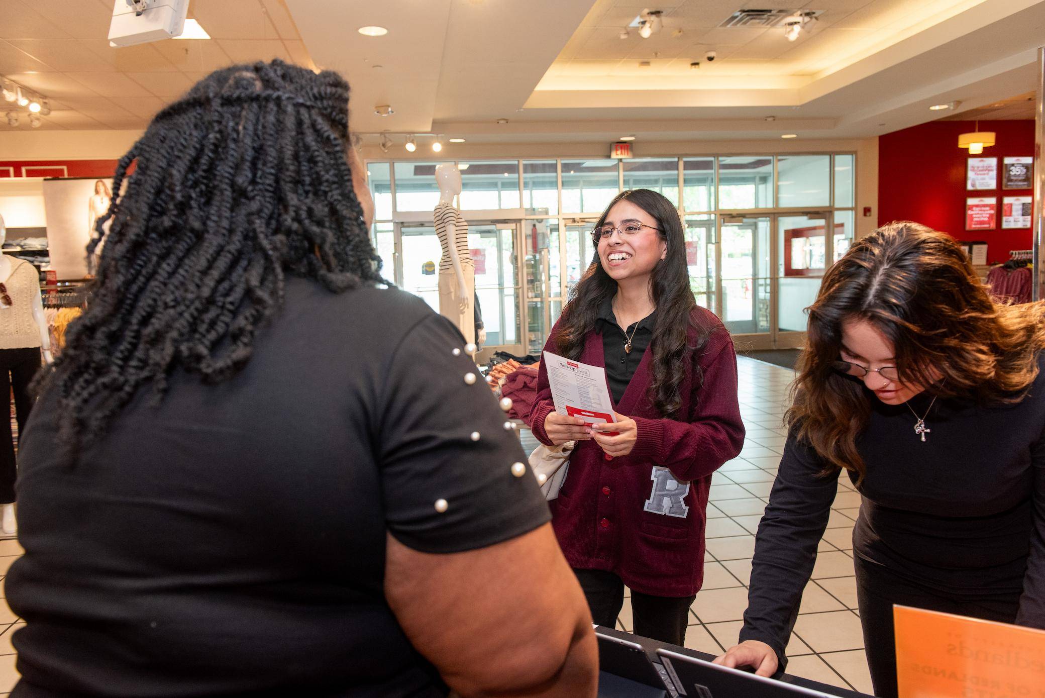 a group of people standing in a room