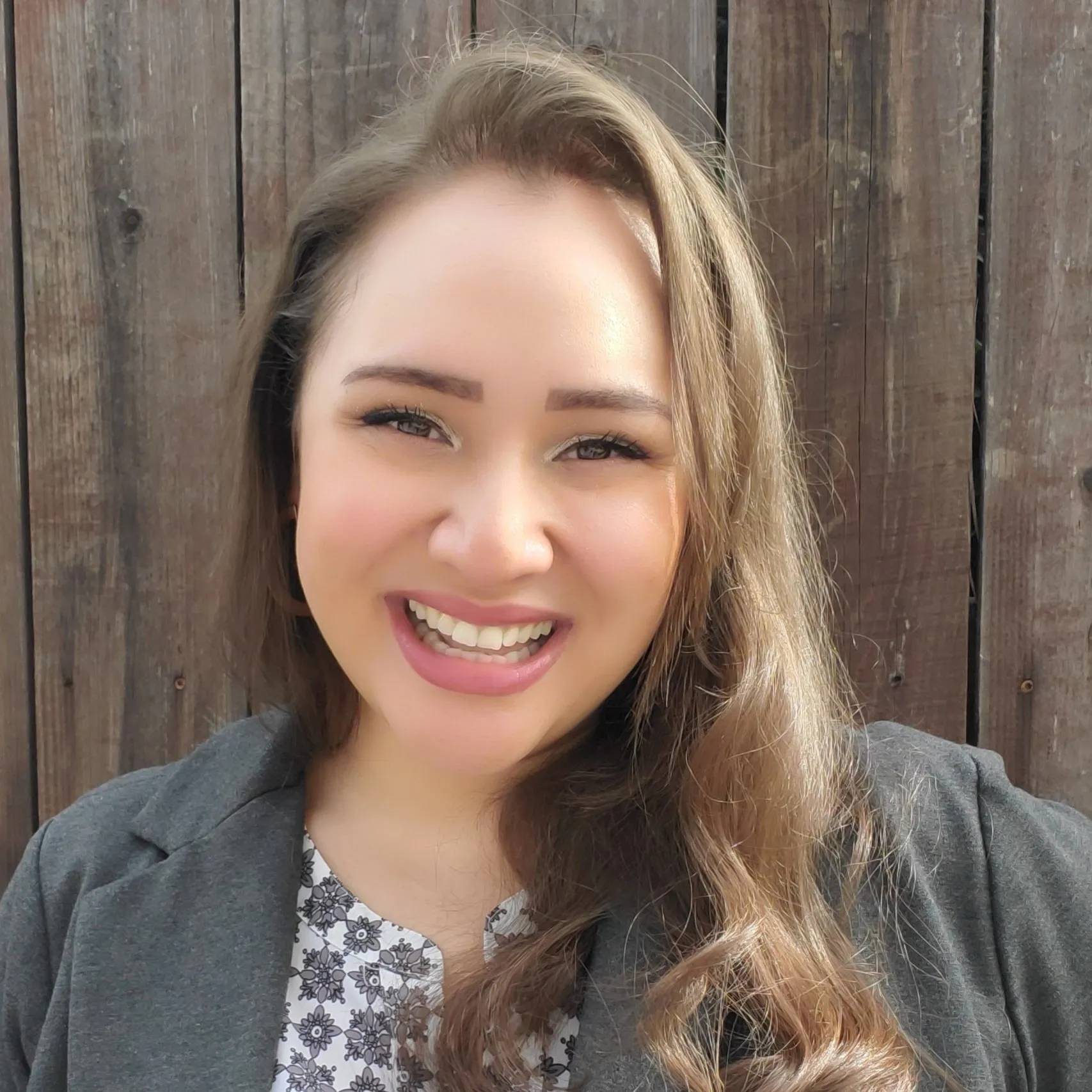 a person smiling at camera