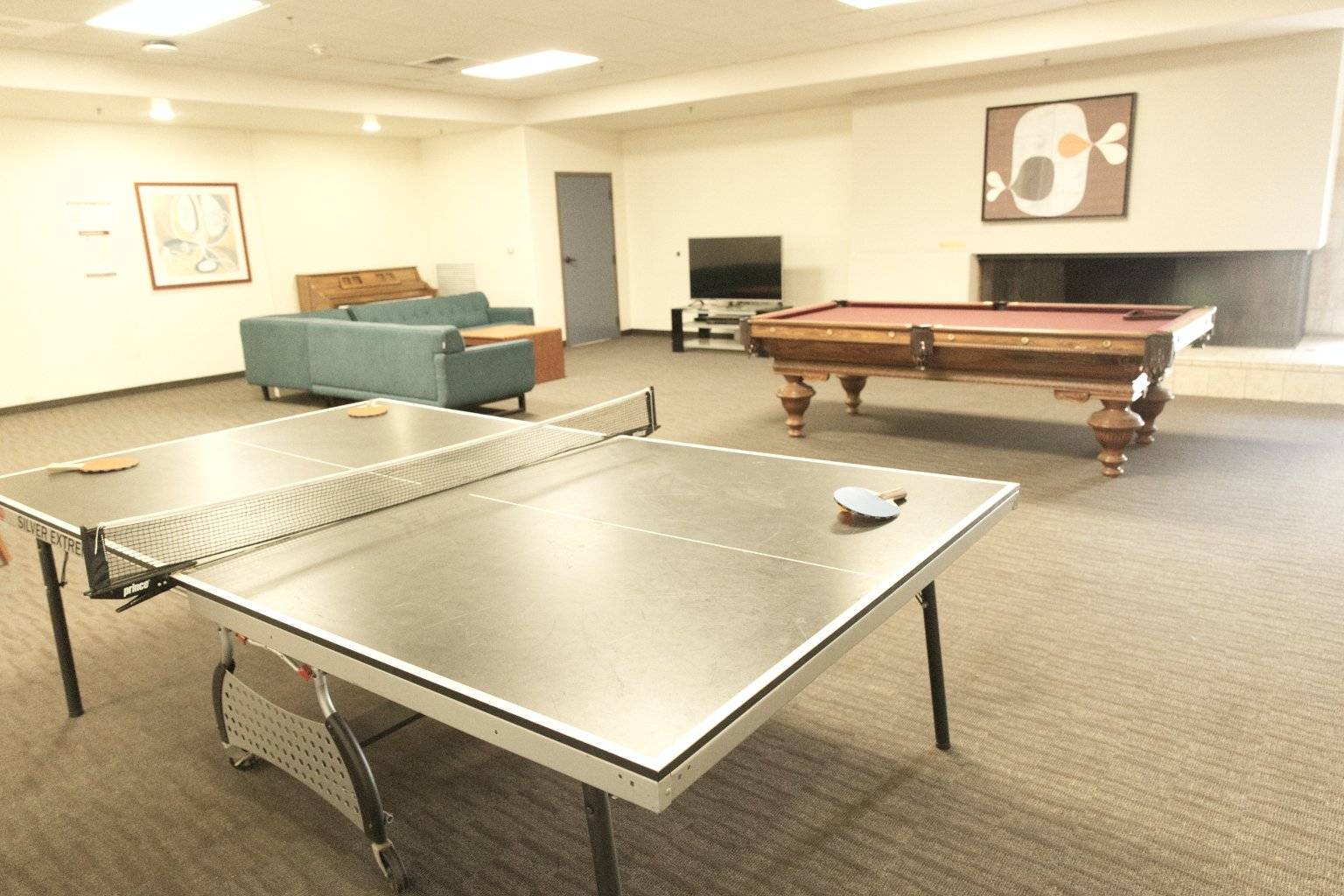 a ping pong table in a room