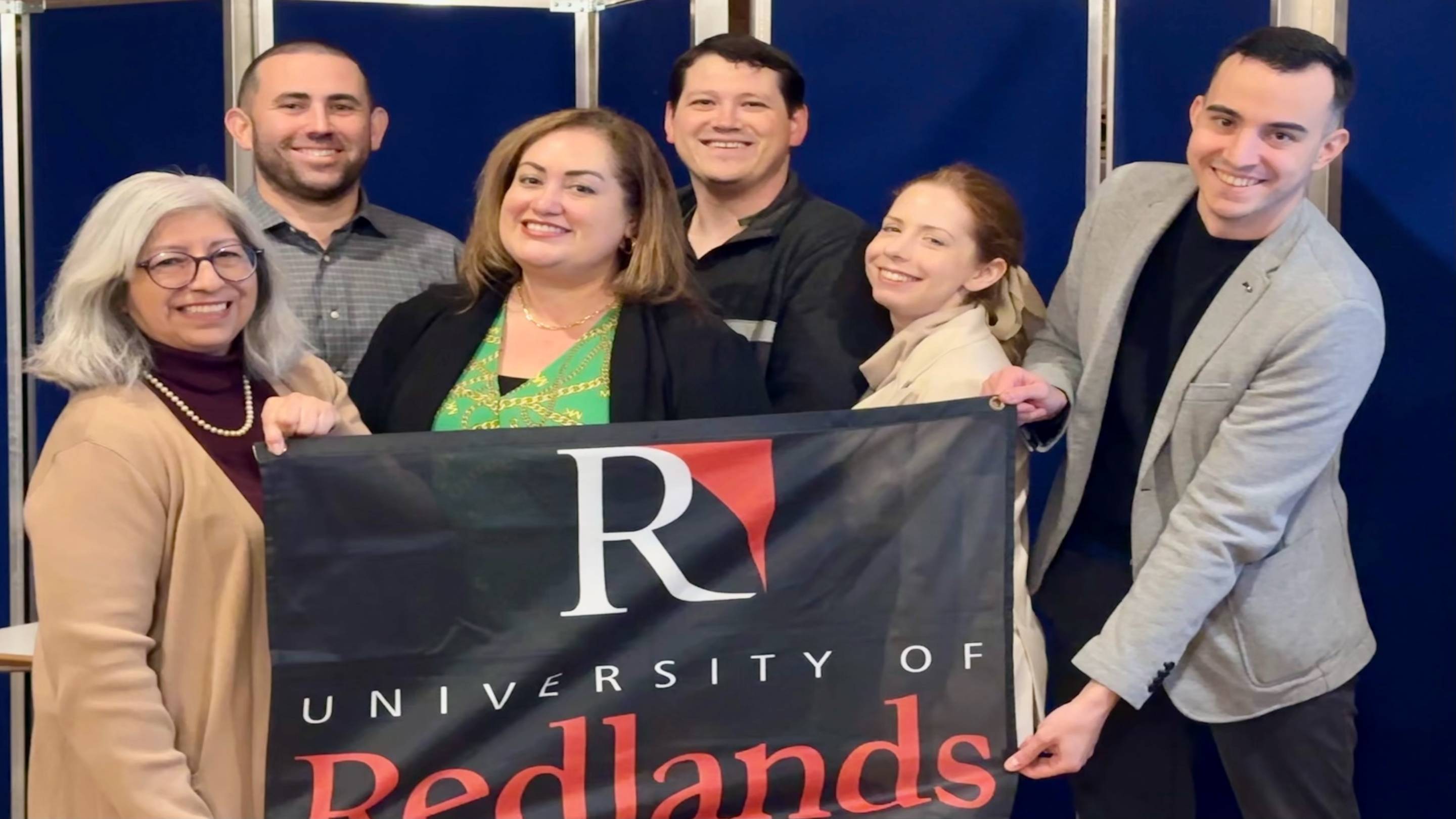 a group of people posing for a photo