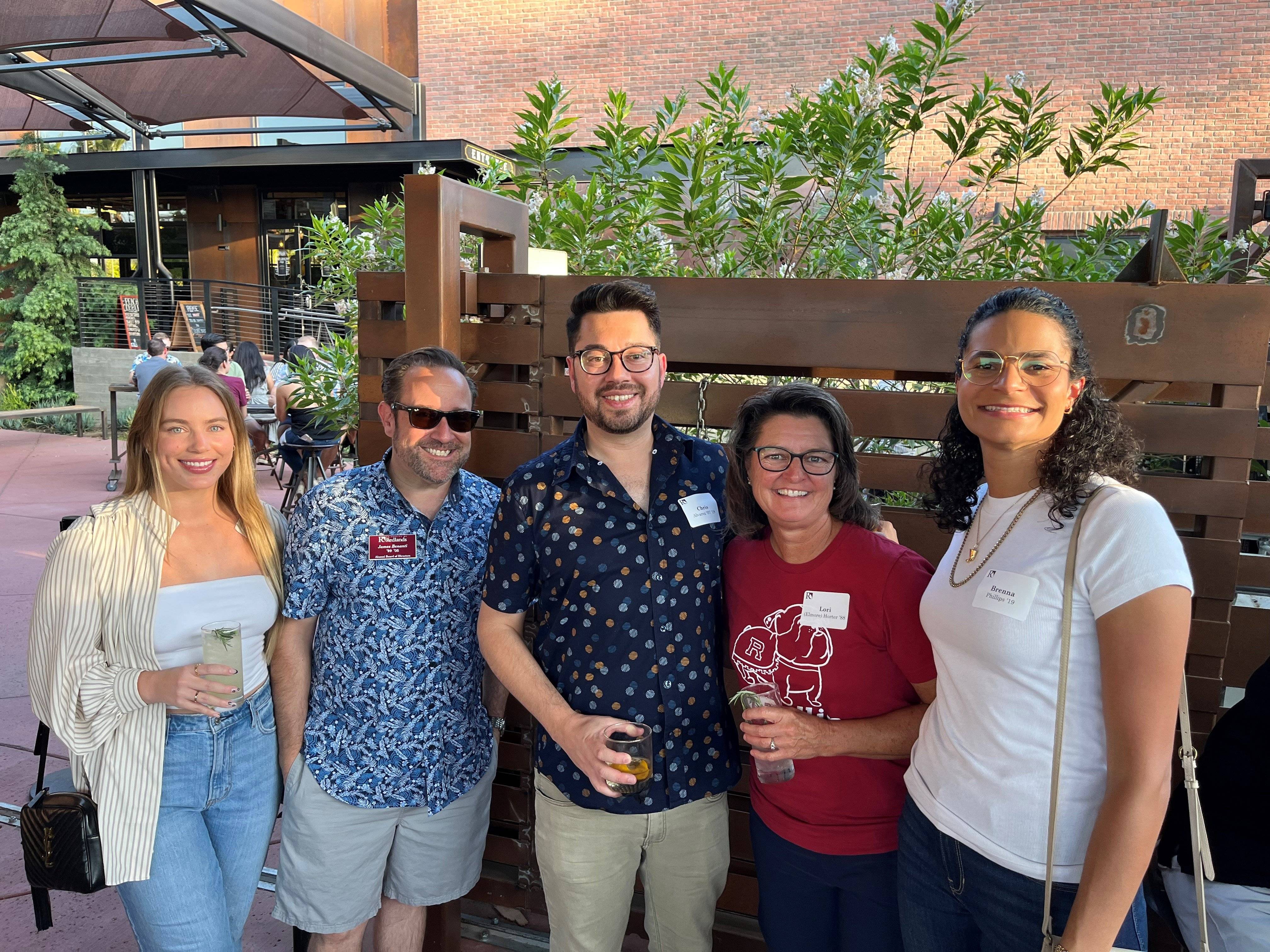 a group of people posing for a photo