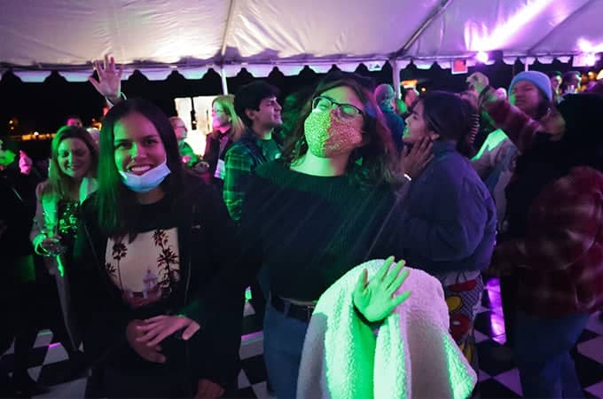 a group of people in a tent