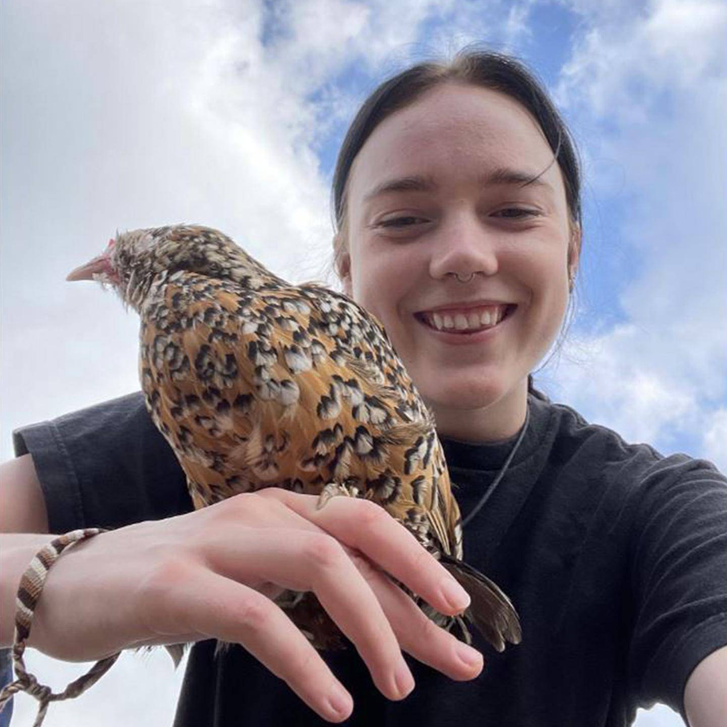 a person holding a bird