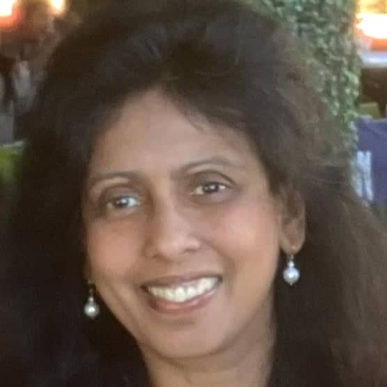 a person smiling for the camera