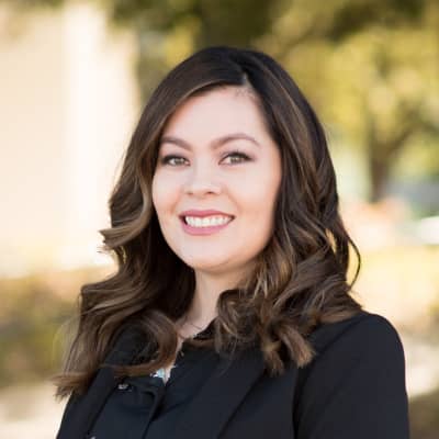 a person smiling at camera