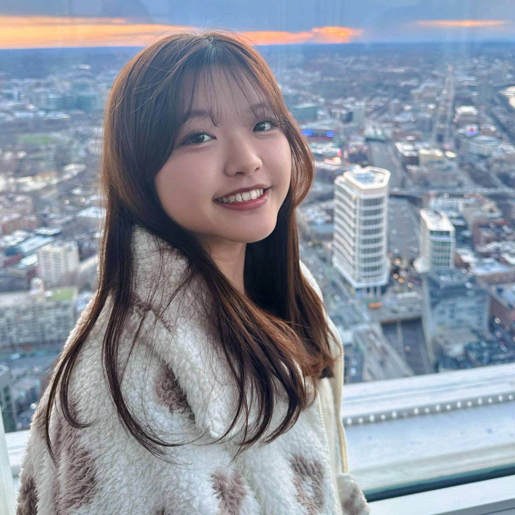 a person smiling at the camera