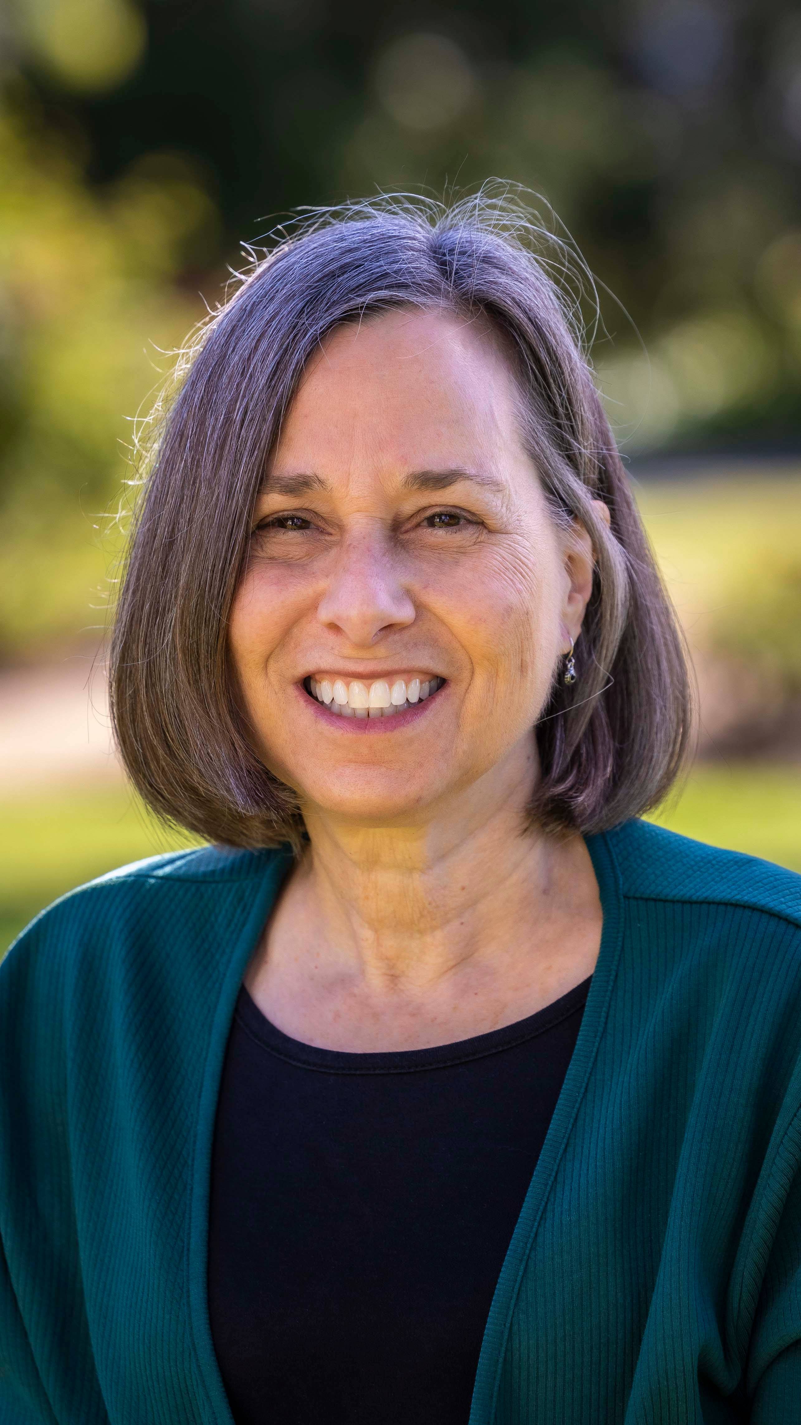 a person smiling for a picture