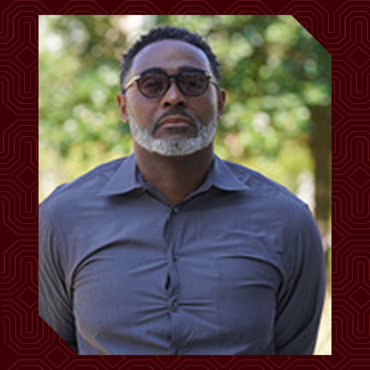 a person with glasses and a beard