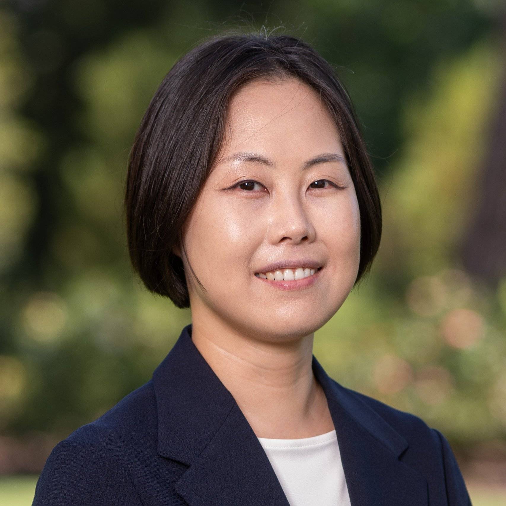 a person smiling at the camera