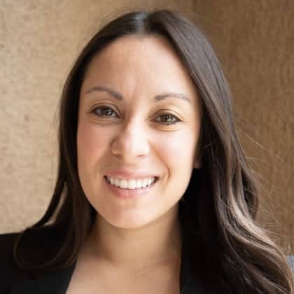 a person smiling at the camera