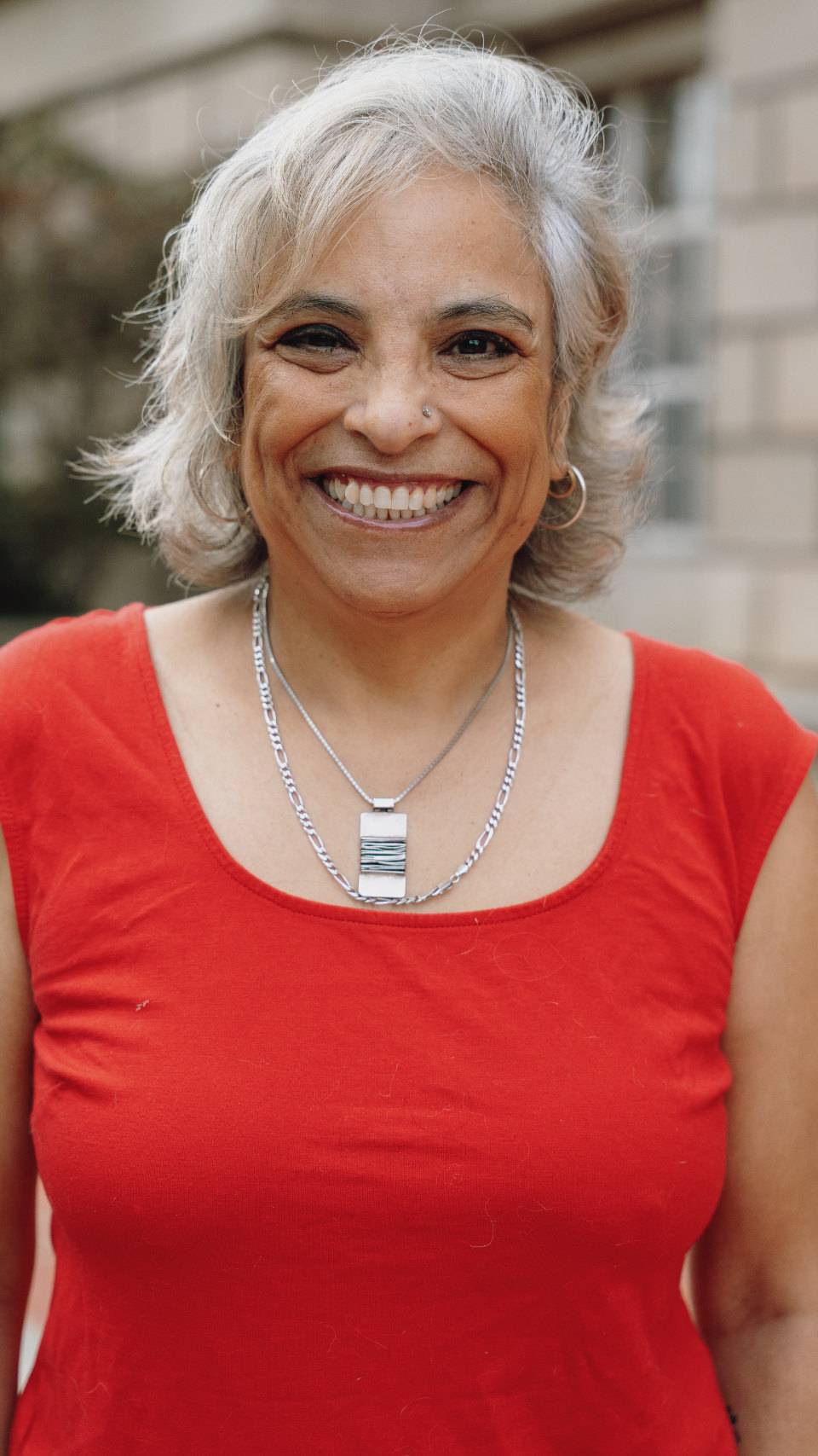 a person smiling at the camera