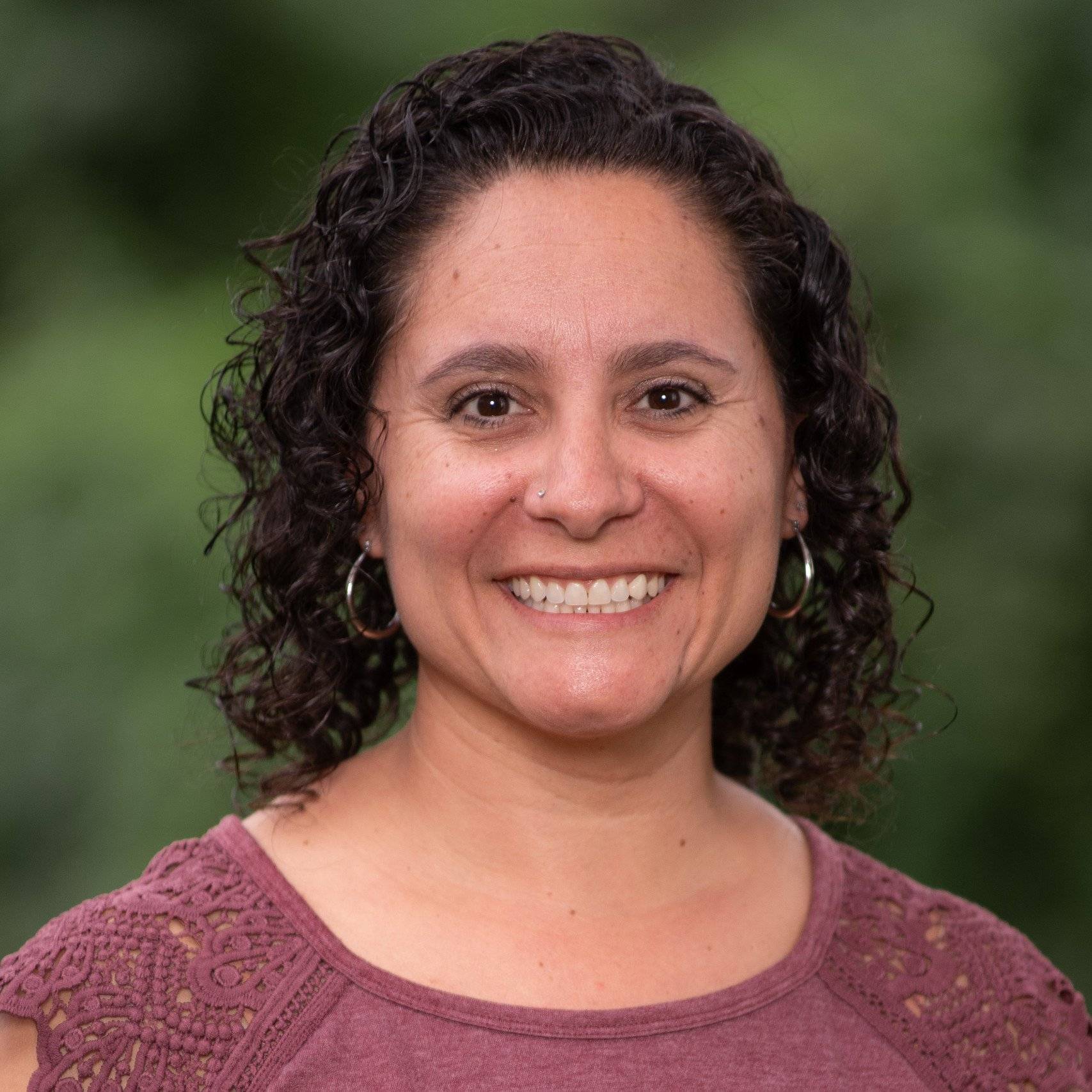 a person smiling for a picture